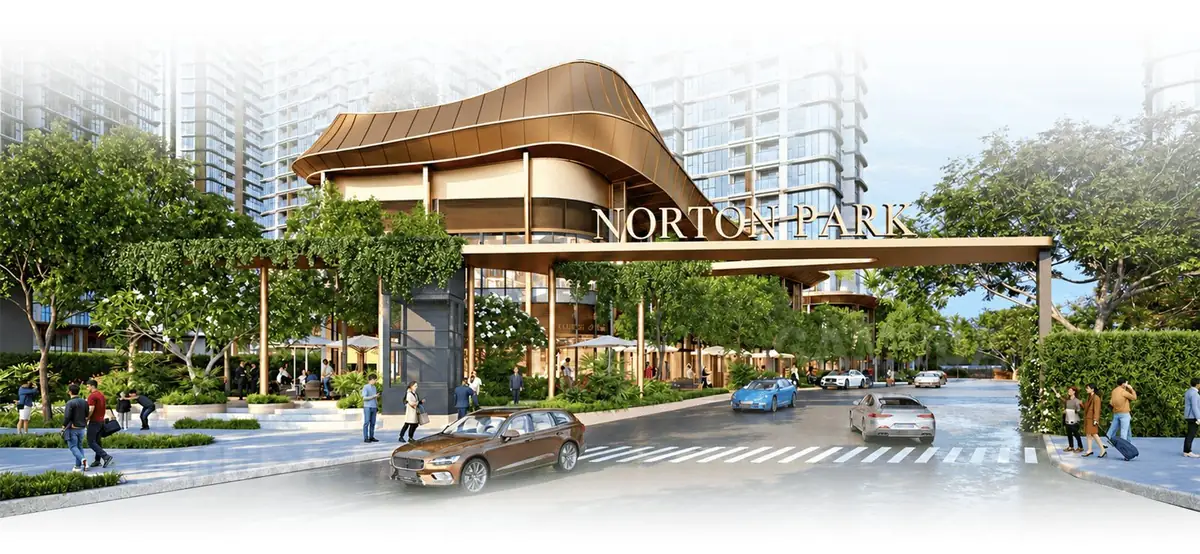 Cổng chính khu căn hộ Norton Park với hàng cây xanh và lối vào nội khu