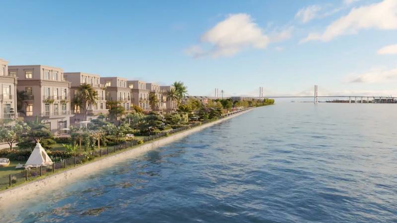 Phối cảnh biển hồ nước mặn Paradise Lagoon ở Vinhomes Green Paradise Cần Giờ: bờ cát, dãy nhà ven hồ, cầu dây văng phía xa