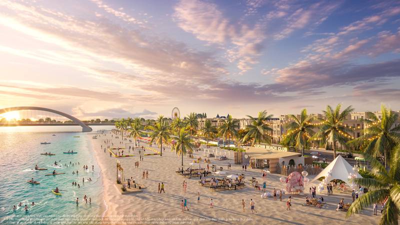 Phối cảnh bãi biển Lucian Beach Club ở Vịnh Tiên, Vinhomes Green Paradise: bãi cát trắng, hàng dừa, lều trắng, vòng quay và cầu vòm phía xa lúc hoàng hôn