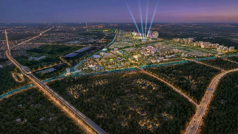 Phối cảnh toàn cảnh Vinhomes Saigon Park về đêm nhìn từ trên cao, kênh và các trục đường lớn bao quanh khu đô thị